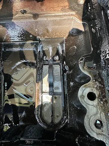 Underside of an engine with the pan removed
